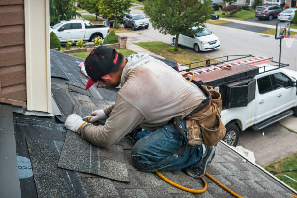 Professional Roofing technician working in East Granby, CT